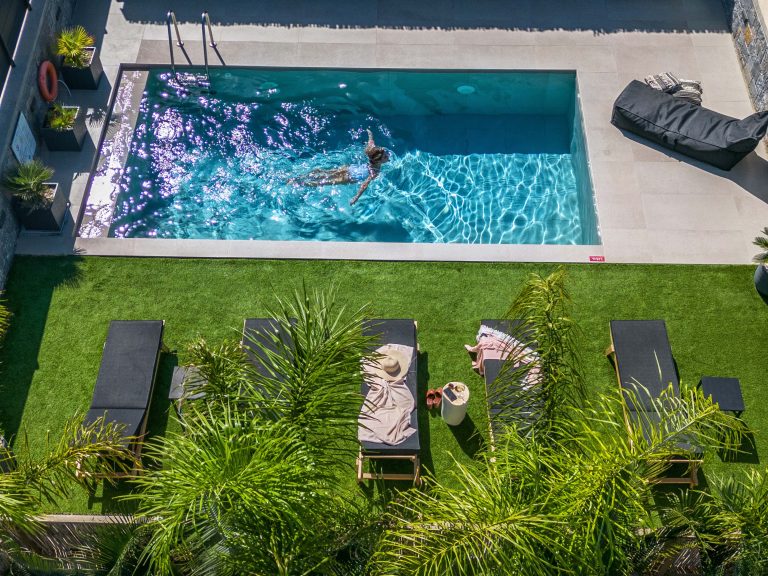 Private pool aerial view with sun loungers at Villa Calma East