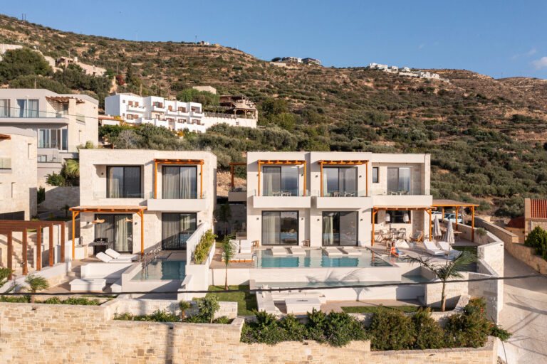 Front exterior of Villa Domenica Falasarna with pool and mountain backdrop