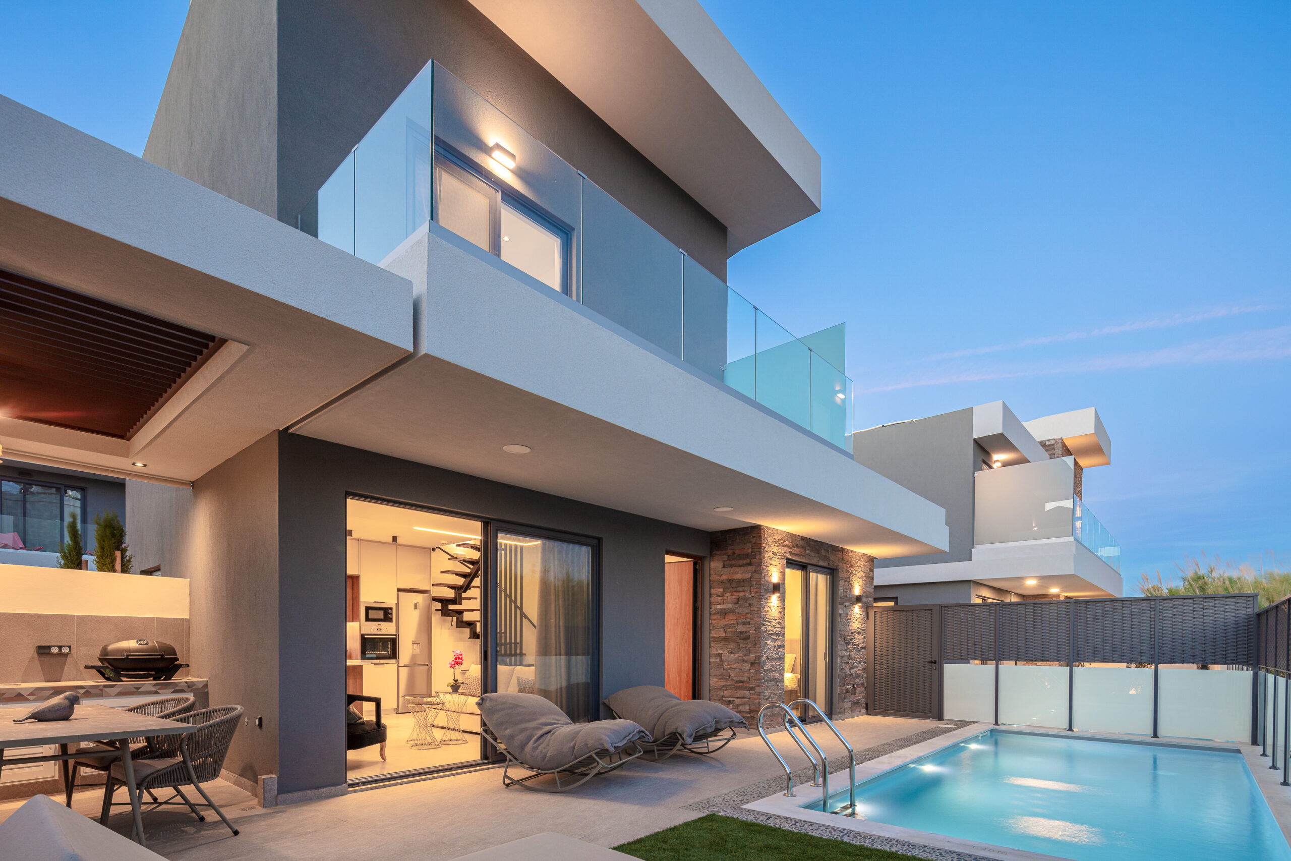 Evening pool view of VillaSaints Villas Chania